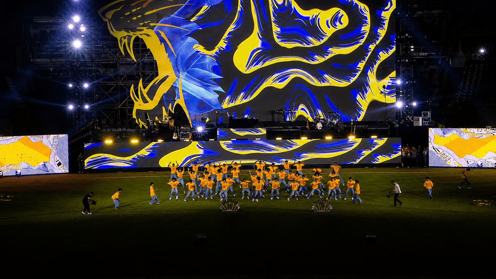 Stadium mega-show with tiger stage visuals