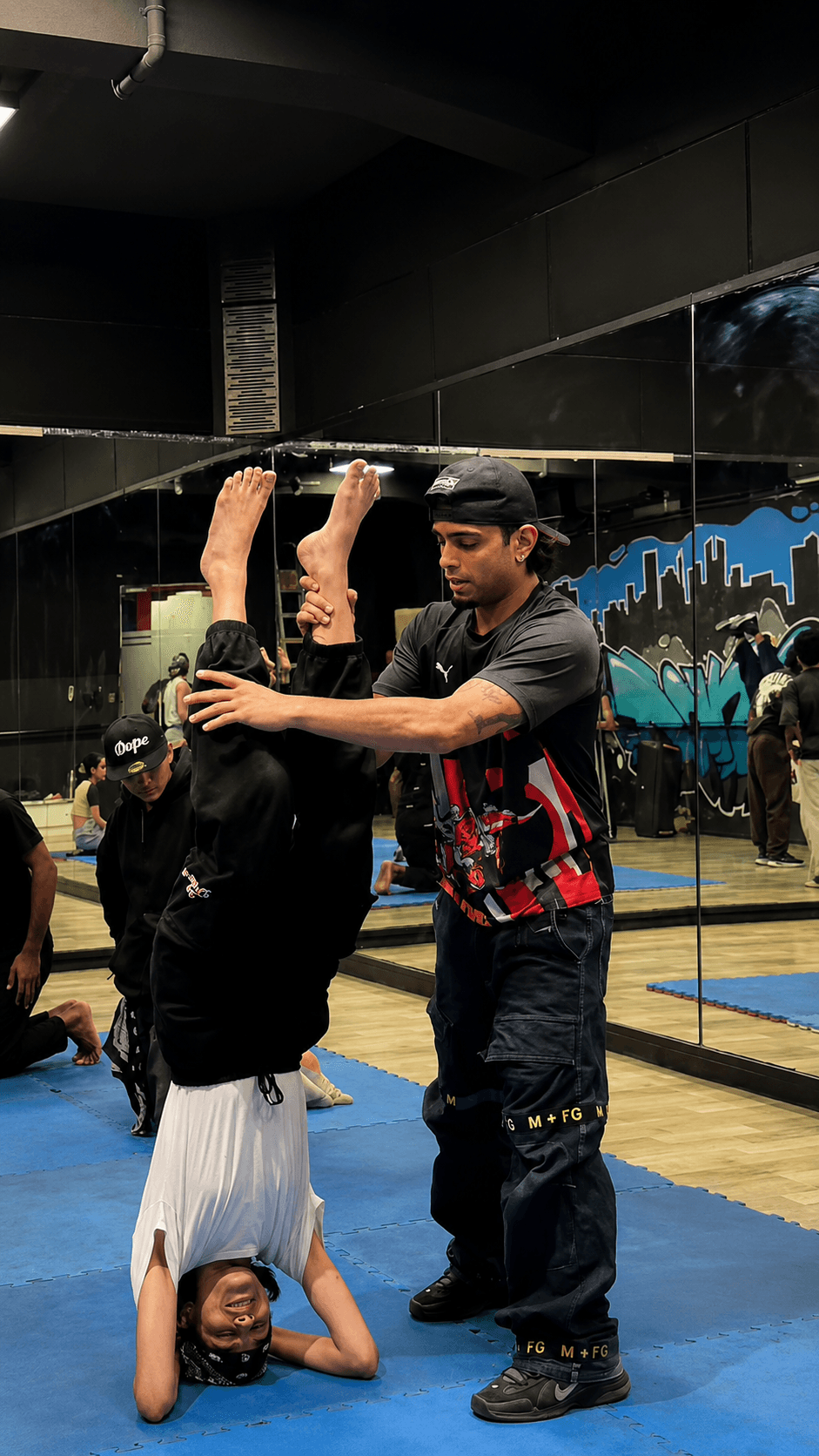 Class technique — hands-on correction in the studio