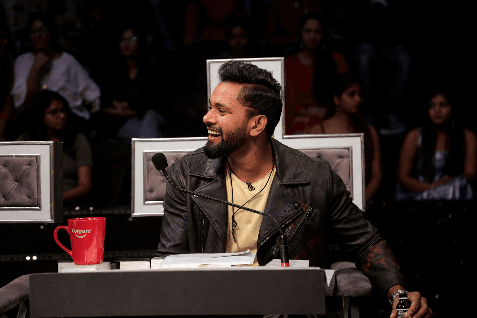 Suresh Mukund at the judges' desk on a TV show